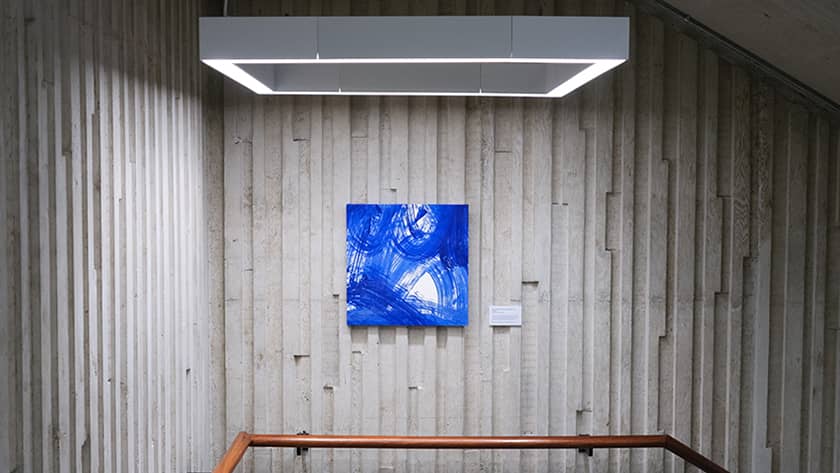 Traces exhibition in the library stairwell