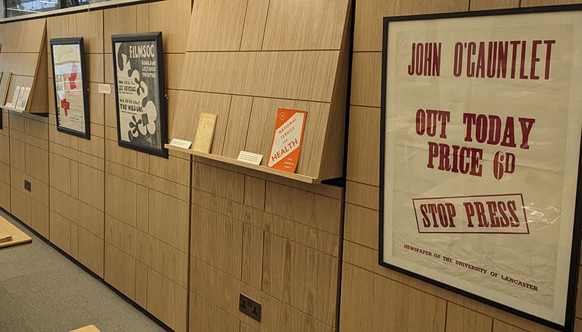 Feature wall in the Archives Research Centre with posters and booklets. 