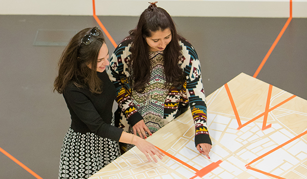 LICA Design Show - two women looking at a design