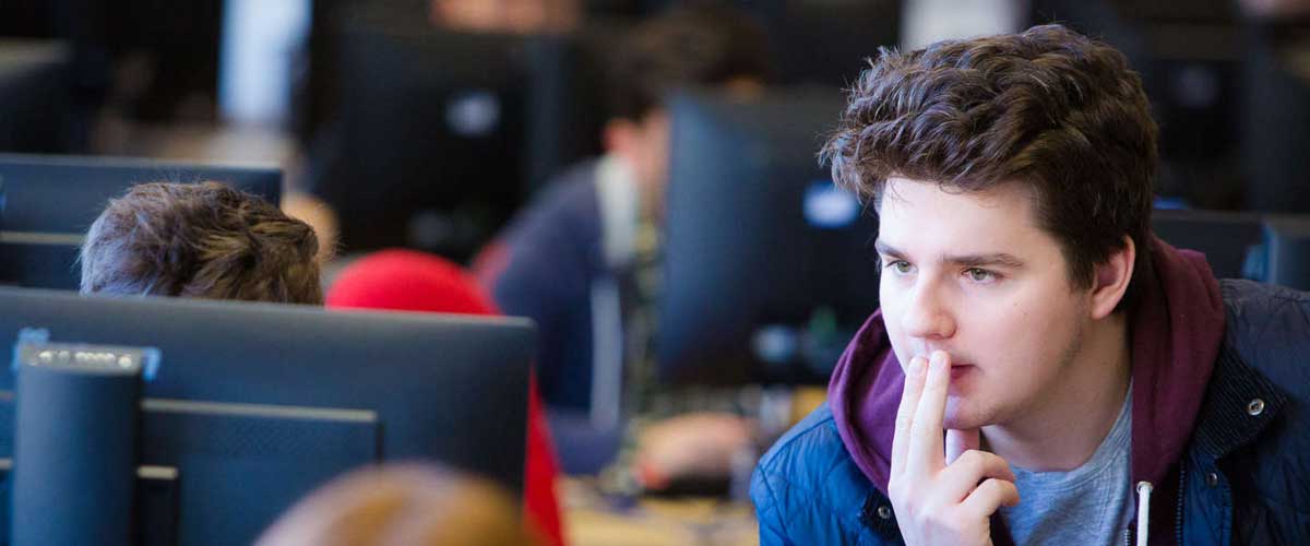 Man sitting in computer lab