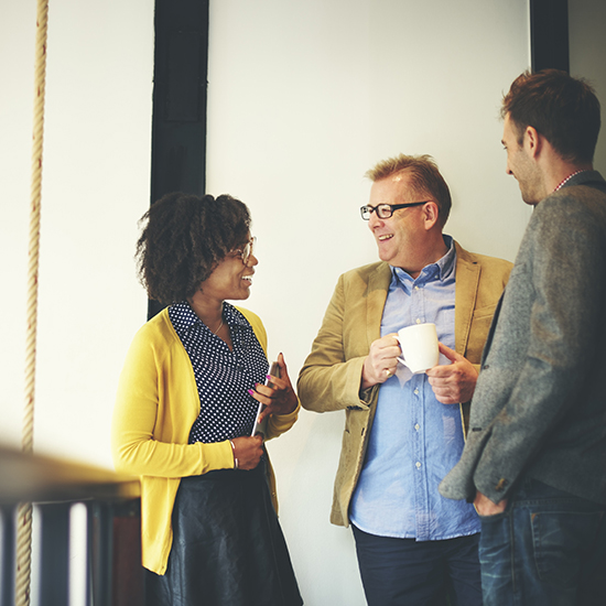 People standing chatting 