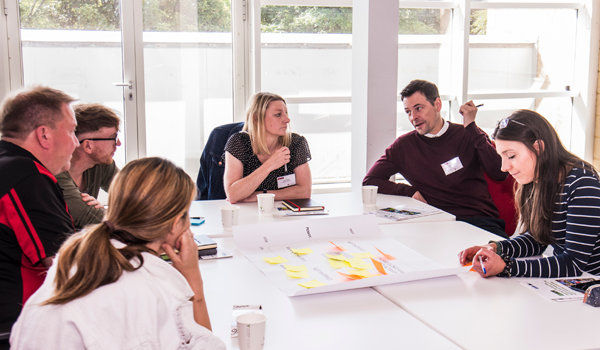 People standing chatting 