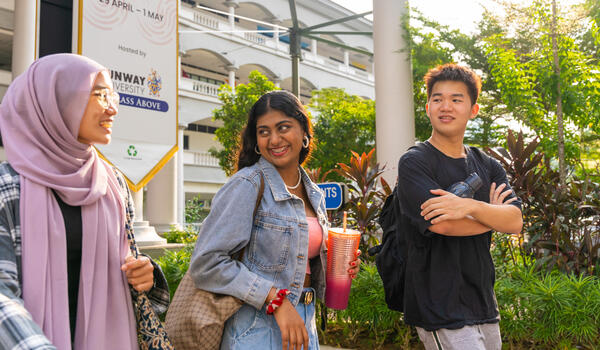 Trio of students photographed on a sunny day at Sunway University campus