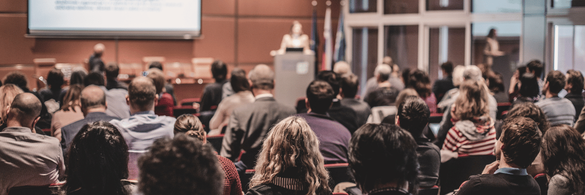 A group of people in a lecture theatre