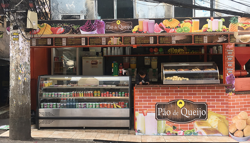 A child plays in his family&rsquo;s refreshment stall.​