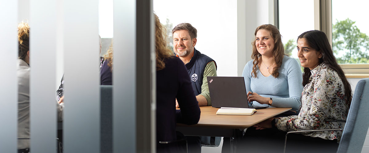 Group of professionals in meeting room