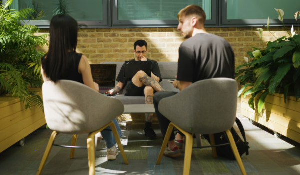 Students working round a table