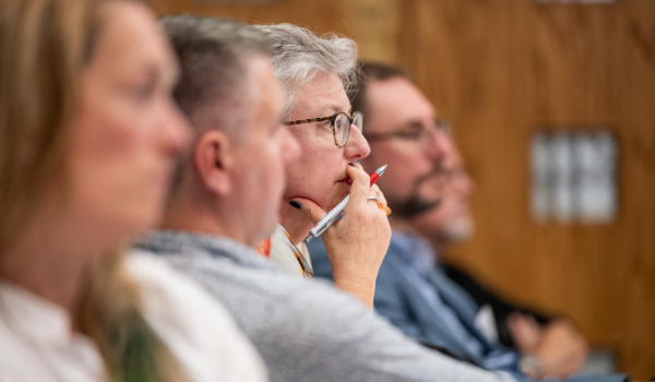 People listening to a workshop 