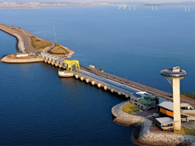Lighthouse and tidal barrier