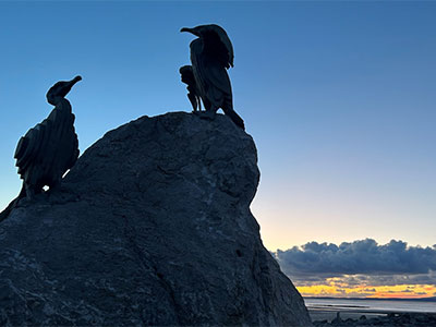 Silhouette of bird statue