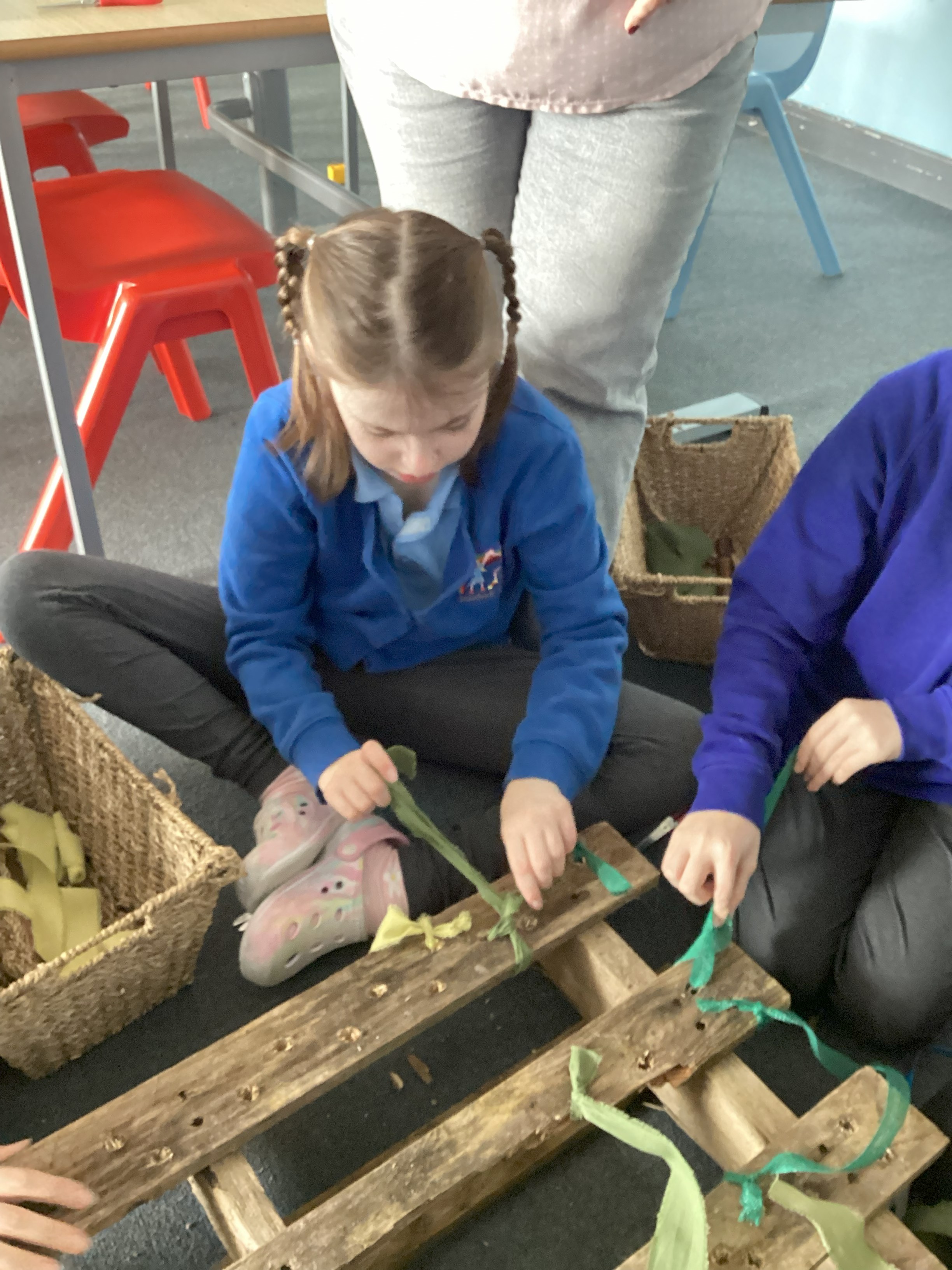 Pupils making interventions out of palettes that can support seagrass growth