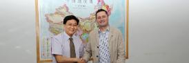 Professor Yigang Xu, the Director of the Guangdong Institute of Geochemistry, Chinese Academy of Sciences and Lancaster University Deputy Vice-Chancellor Professor Andrew Atherton sign the agreement.