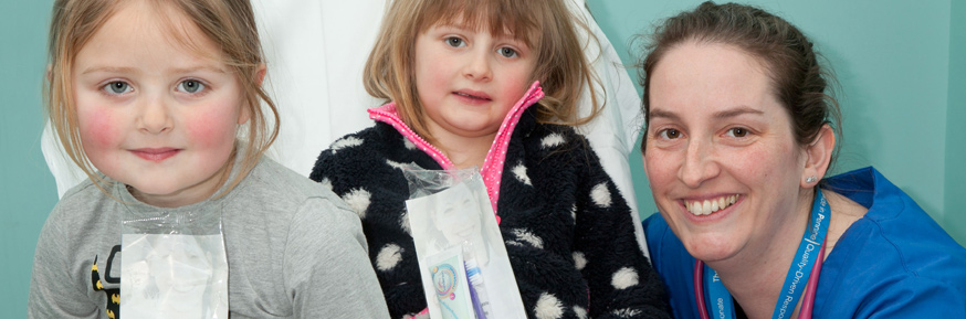 Dr Rachel Isba with children during a dental health week.