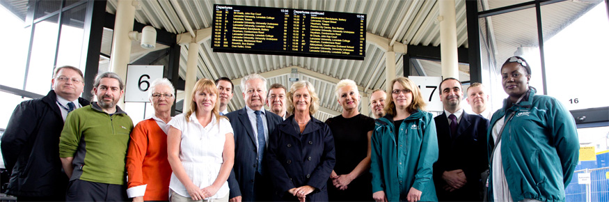 Representatives from Lancaster City Council's Overview and Scrutiny Committee, United Utilities, Lancaster University and Stagecoach unveil a new information board at Lancaster Bus Station 

