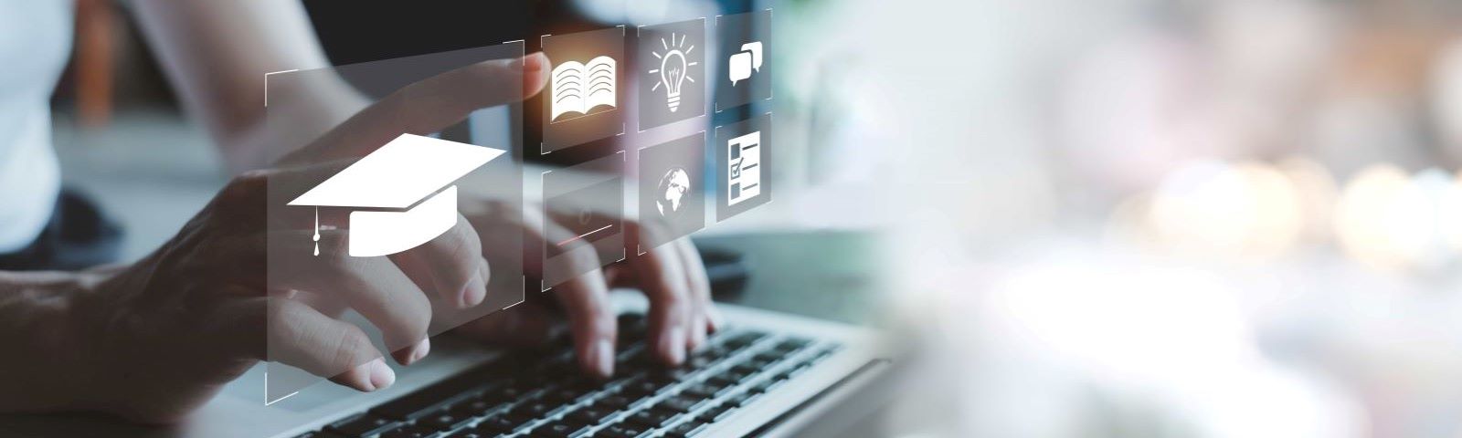 Some one typing on a laptop and touching an icon on a digital graphic.