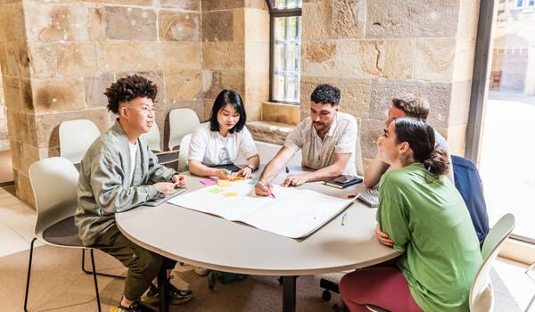 Red graphic of arrows pointing in one direction