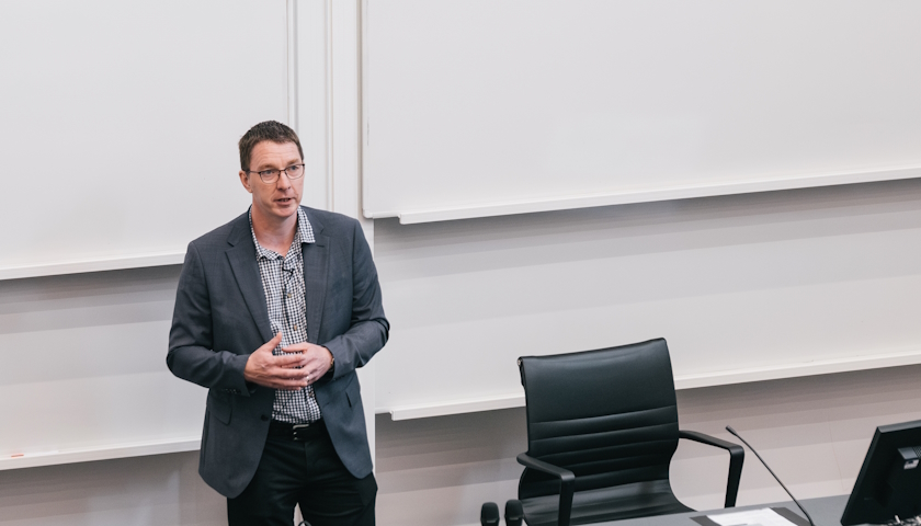 Professor James Faulconbridge, speaking in a lecture theatre.