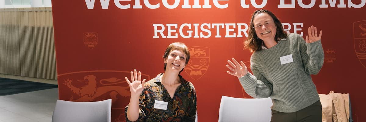 Izzy Hoggmascall and Laura Giles welcome attendees to the Festival of Sustainability, 26 Jun 2025