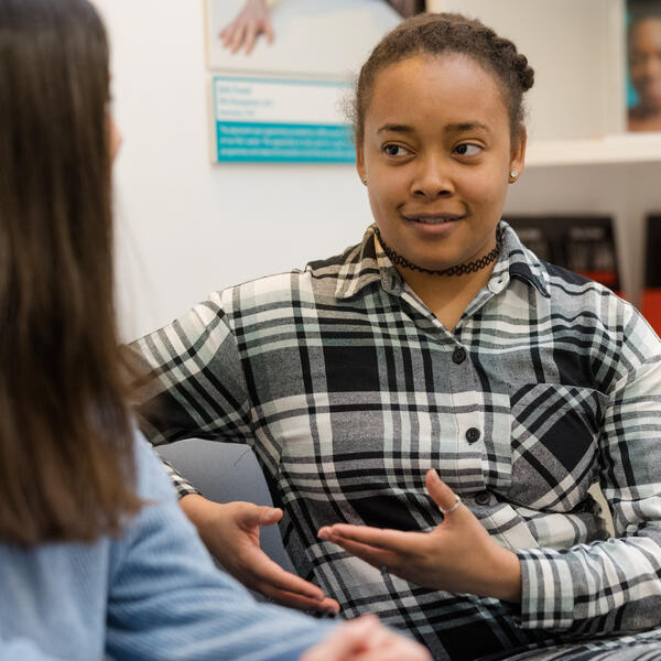 Two girls having a conversation 