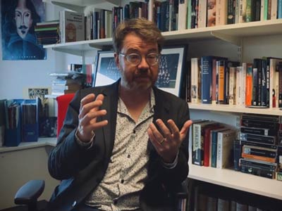 Andy Tate, in his office in County Main, talking animatedly with his hands