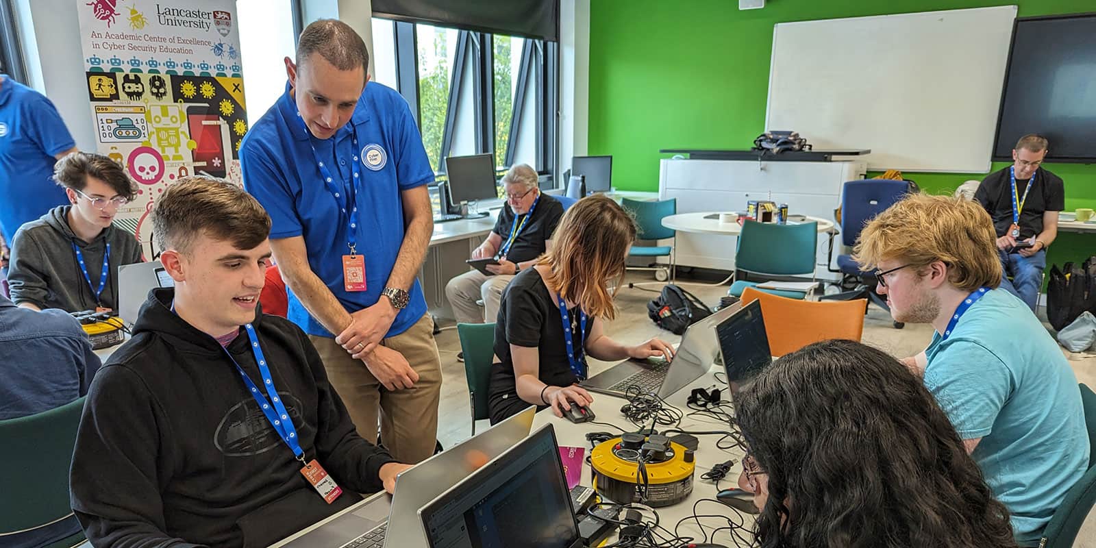 Young people learning about cyber technology