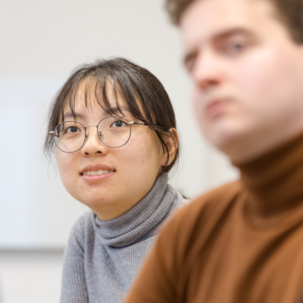A student listening to a lecture