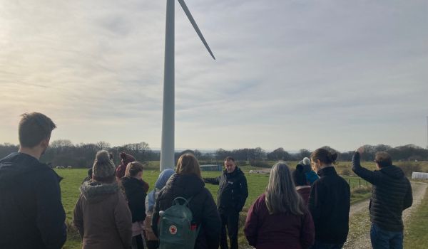 People visiting the wind turbine