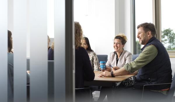 Staff sat in a meeting
