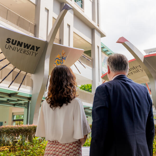 Two people stood at Sunway campus in Malaysia