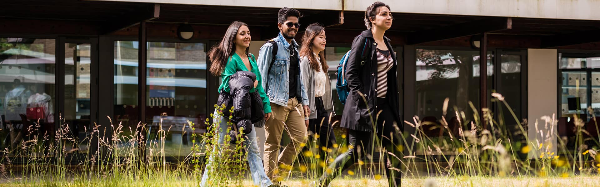 Students walking outside on campus